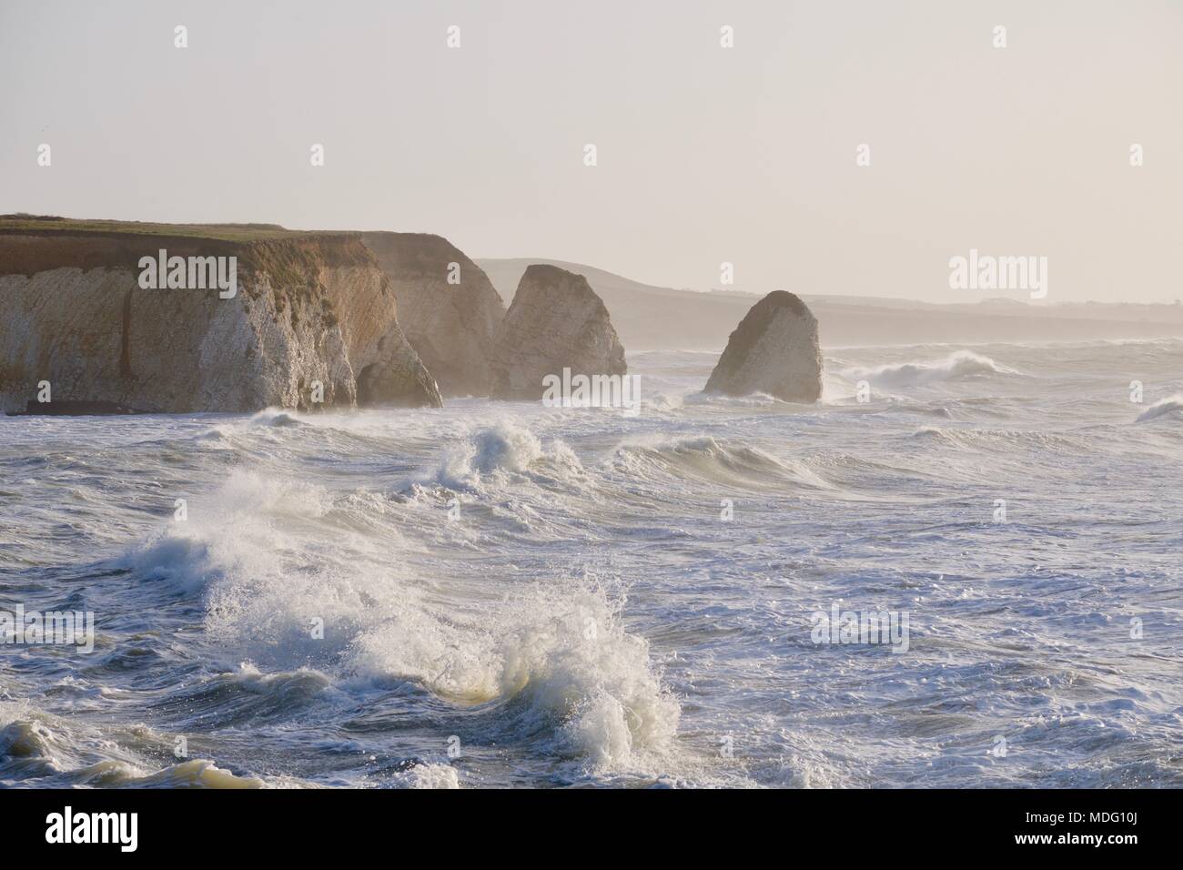 rough sea with large waves crashing onto rocks at Freshwater Bay, Isle