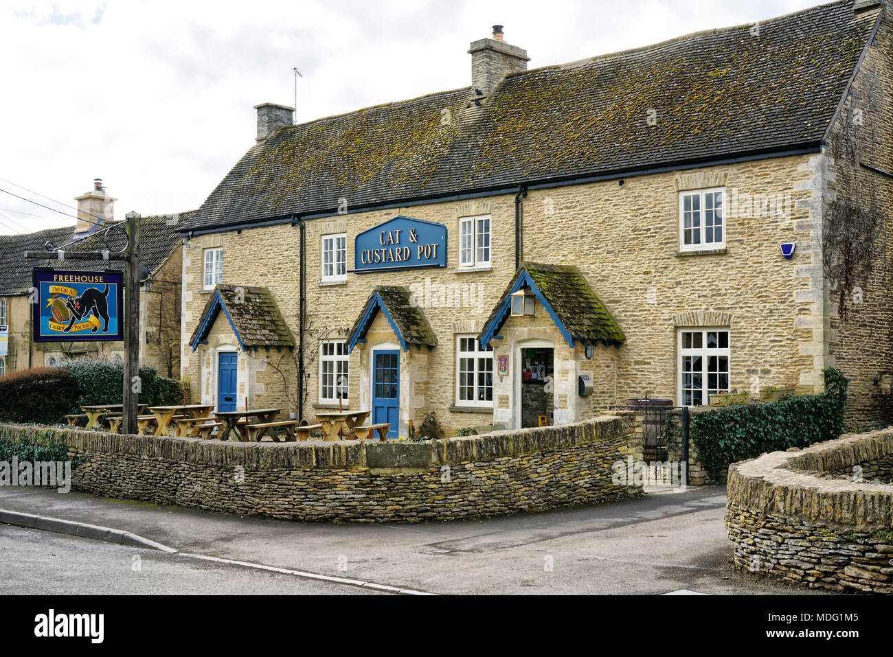 The Cat & Custard Pot public house in Shipton Moyne, The Cotswolds, Gloucestershire, UK Stock Photo