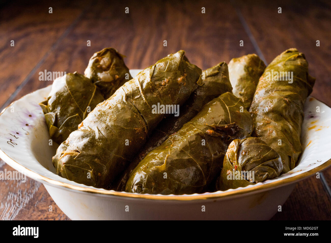 Turkish Food Dolma Stuffed Grape Leaves with Minced Meat, Rice and Tomato Paste / Sarma