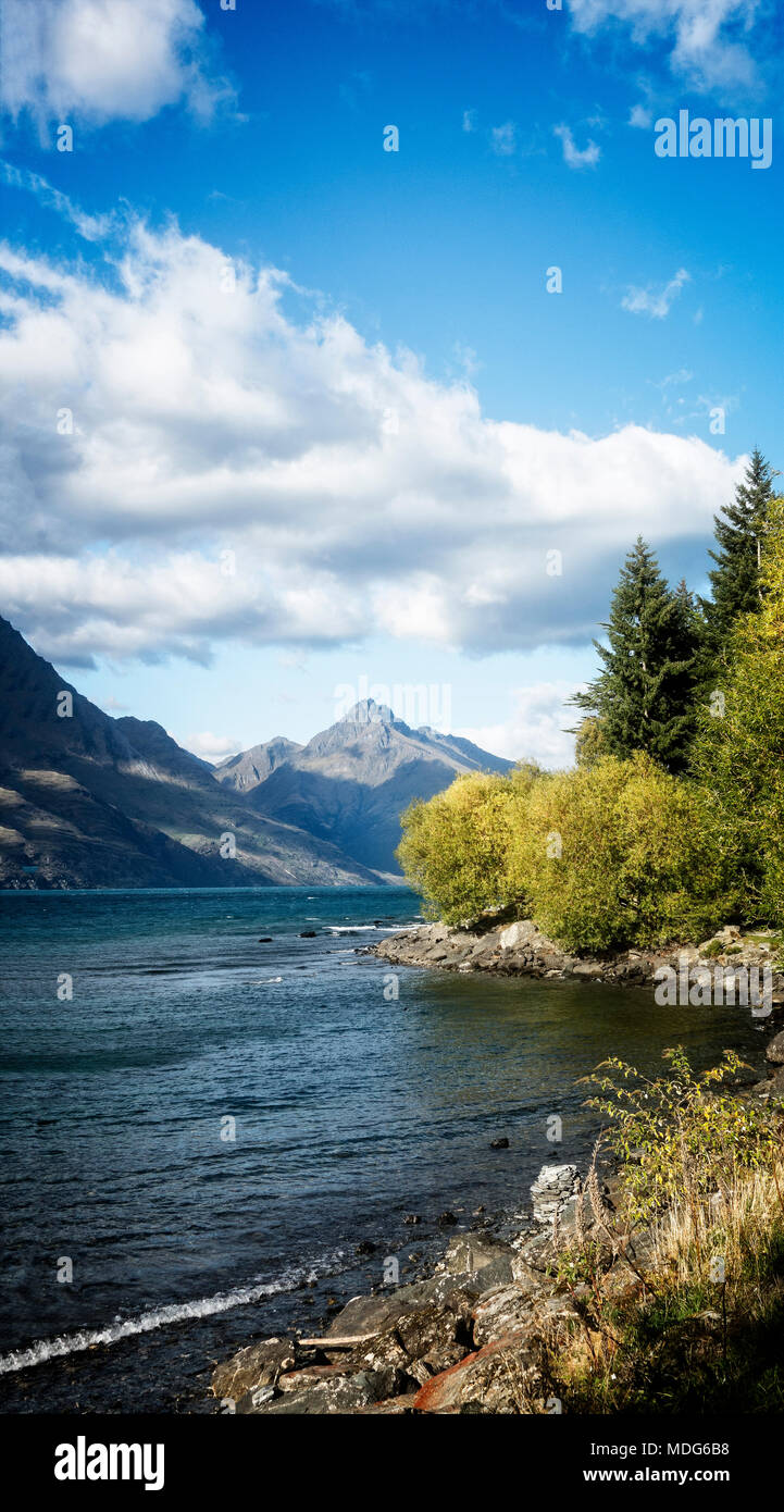 Mountains rise on all sides of Lake Wakatipu near Queenstown, South Island, New Zealand. Stock Photo
