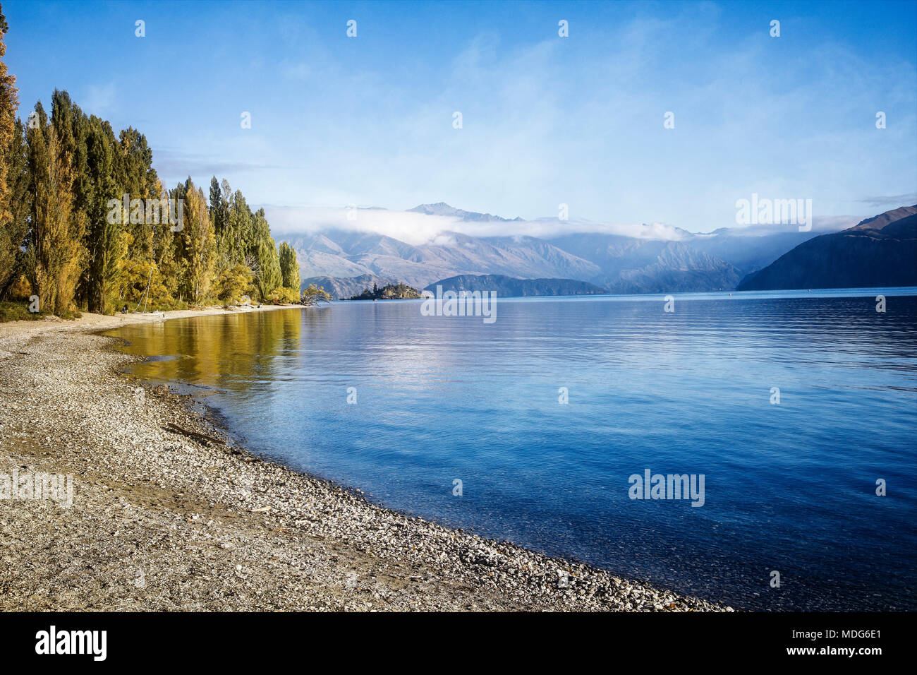 Morning sunshine baths Lake Wanaka, South Island, New Zealand Stock