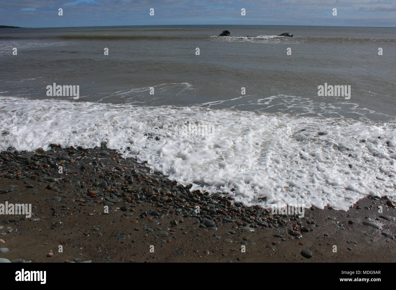 Wave action at Long Beach, Lower East Chezzetcook, Nova Scotia, Canada Stock Photo