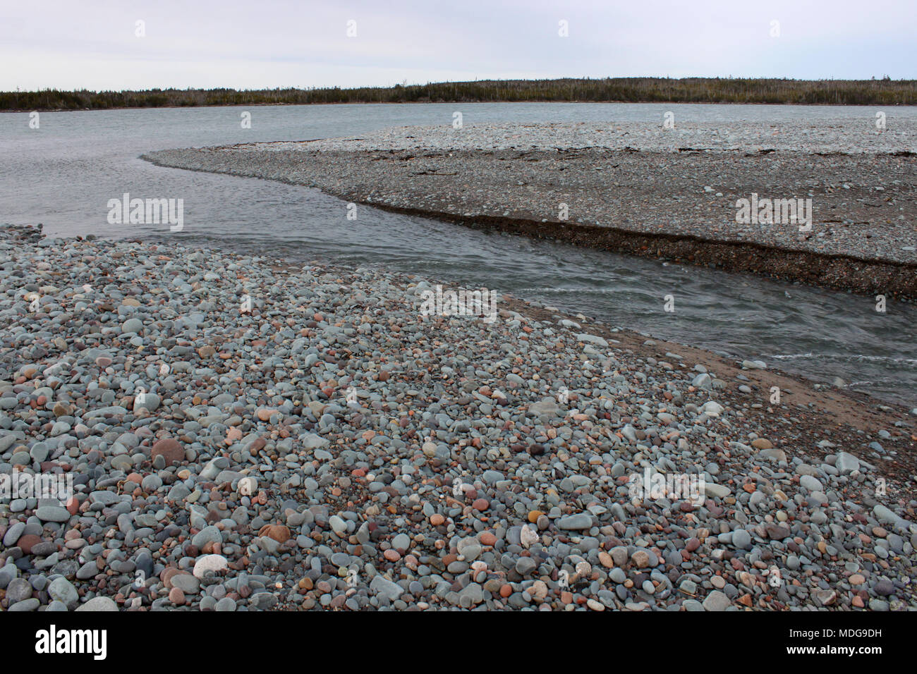 Temporary stream draining Big Lake after barrier breach at Long Beach, Lower East Chezzetcook, Nova Scotia, Canada Stock Photo