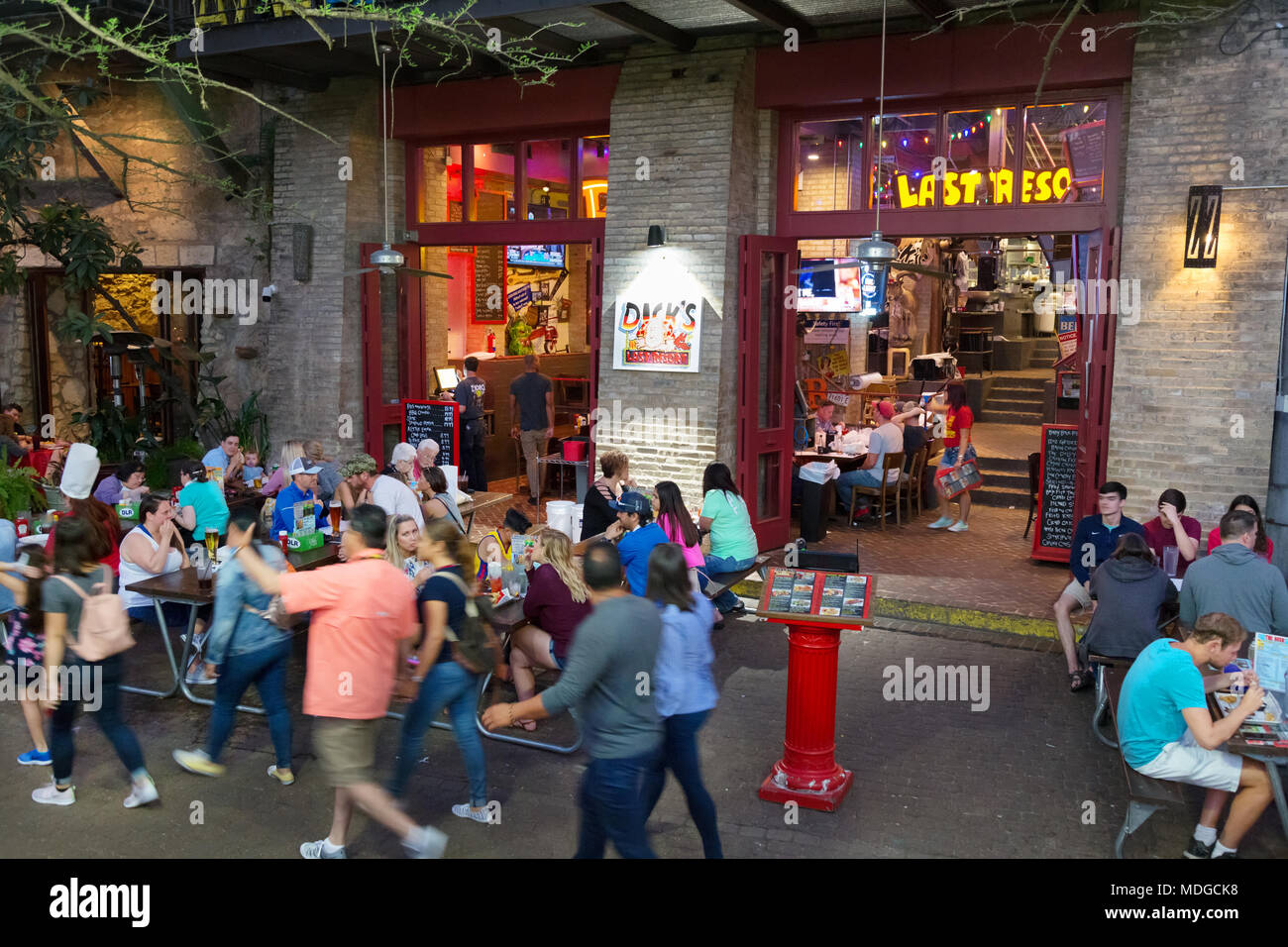 Tourists and local people at Dicks Last Resort restaurant, San Antonio river walk, downtown San Antonio, Texas USA Stock Photo