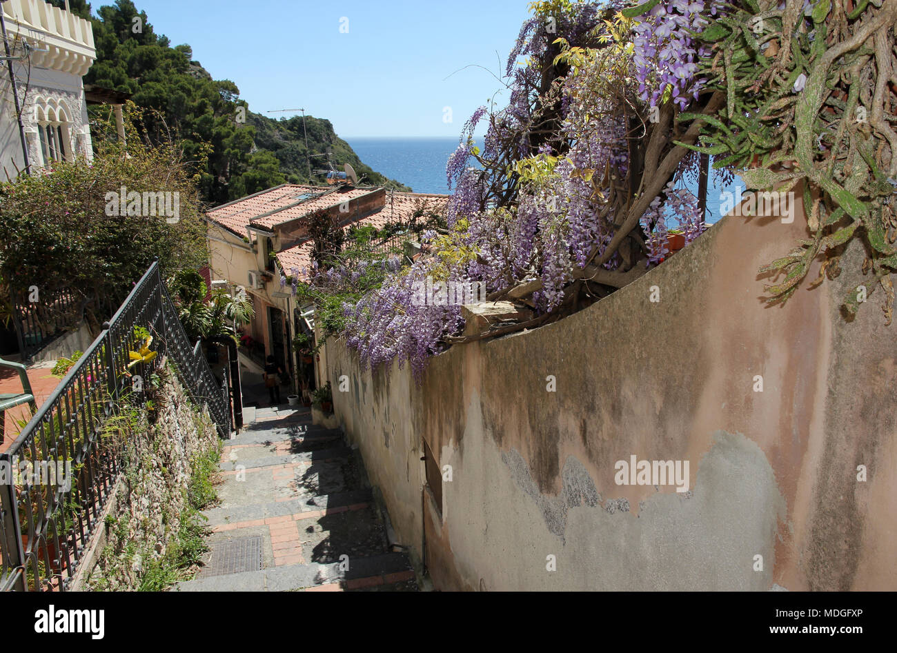 steps to beach Taormina Sicily Stock Photo