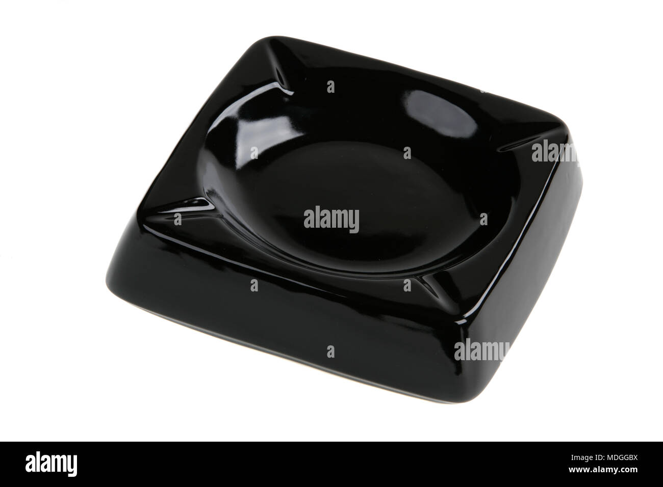 Empty black ceramic ashtray isolated on white Stock Photo