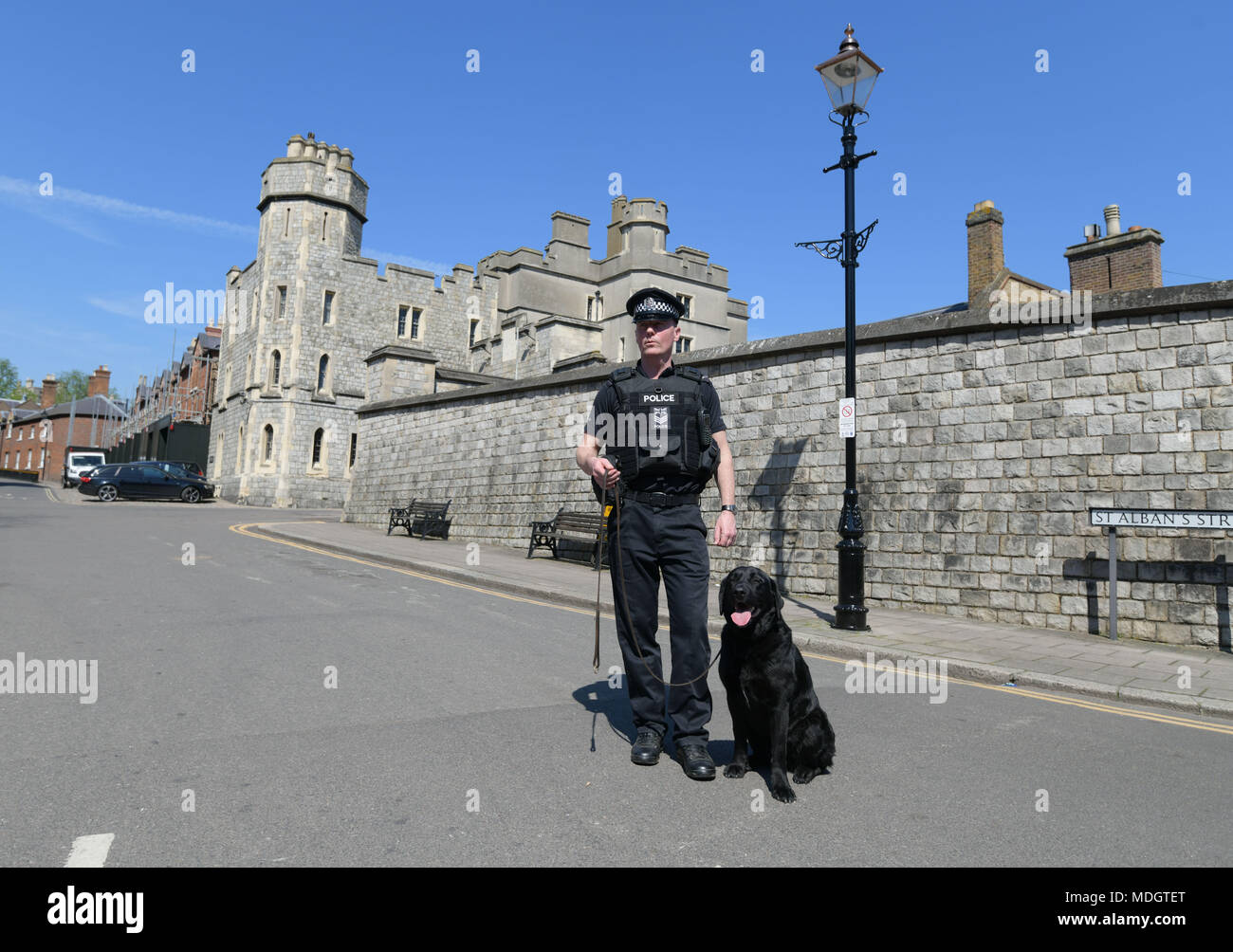 PC Andy Turner with Toby from Thames Valley Police Joint Operations Dog Unit on patrol in Windsor ahead of next month's wedding of Prince Harry and Meghan Markle. Stock Photo