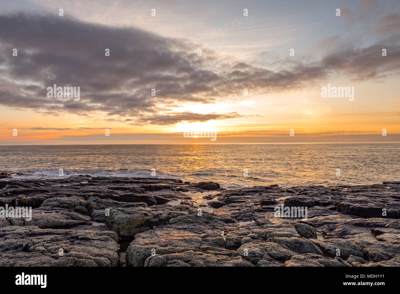 Sunrise at Craster, Northumberland April 2018 Stock Photo