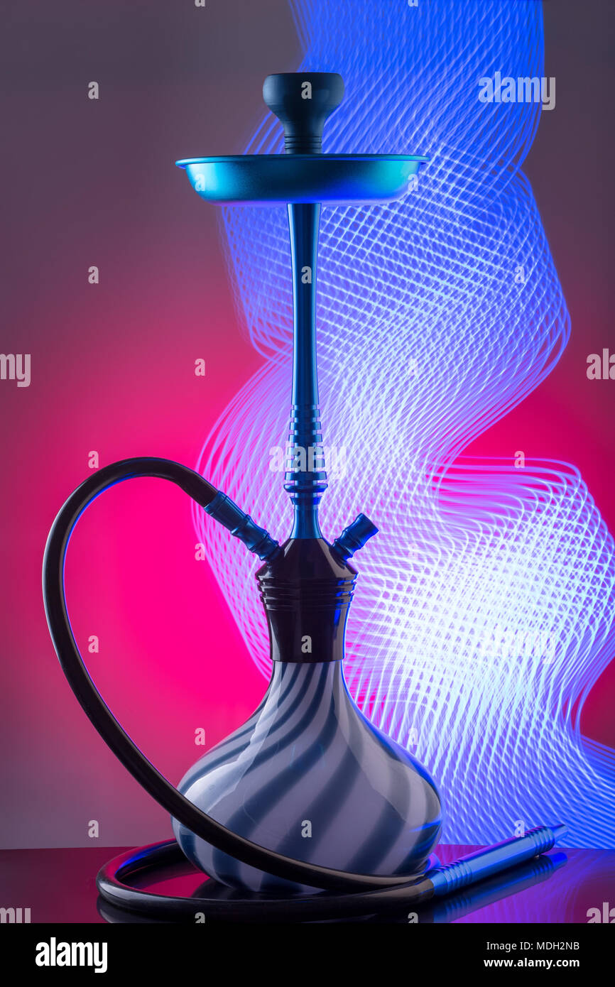 Blue eastern hookah on colorful background Stock Photo Alamy