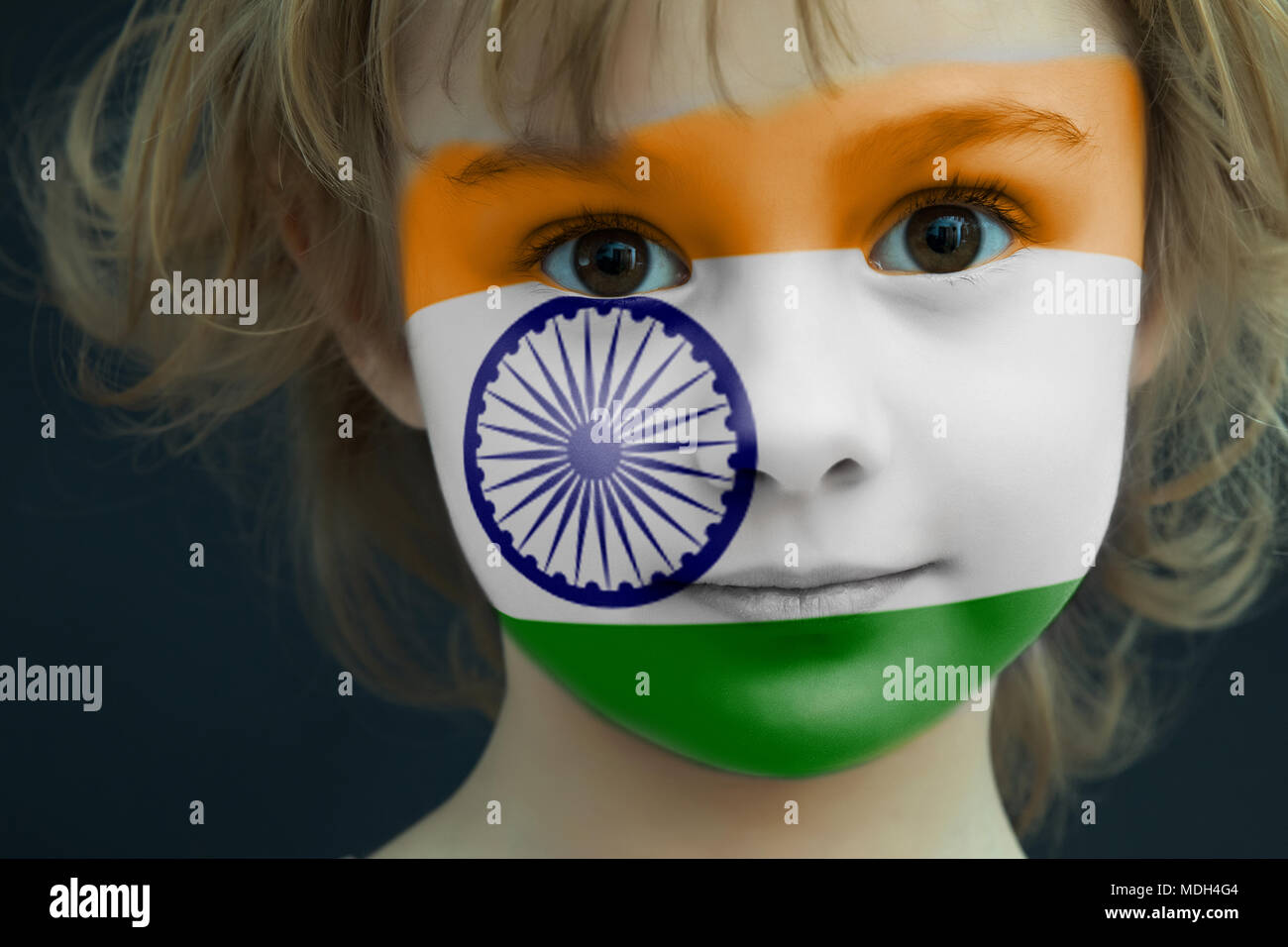 Child with a painted flag of India Stock Photo