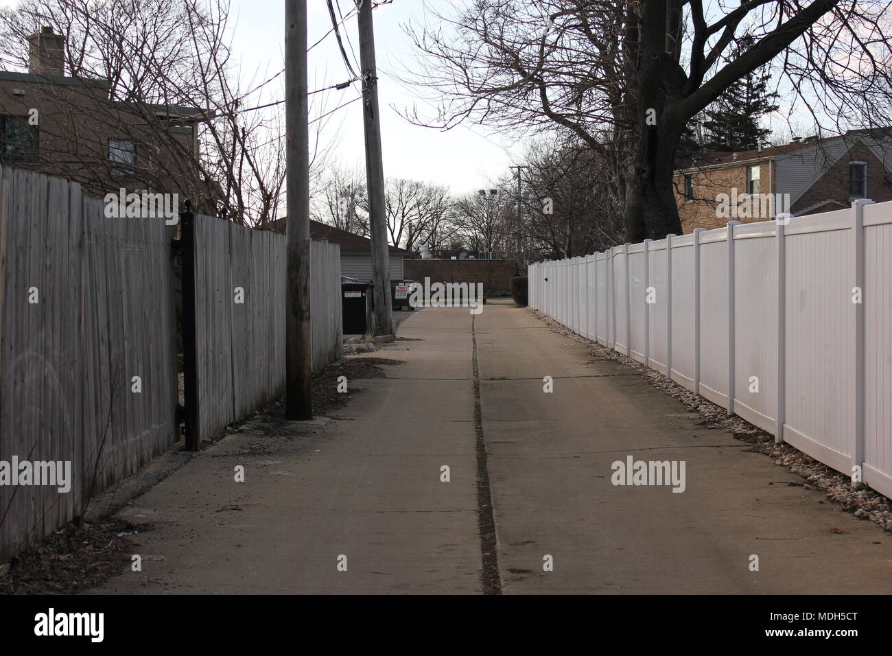 Quiet residential alley streetscape located in Chicago, Illinois Stock