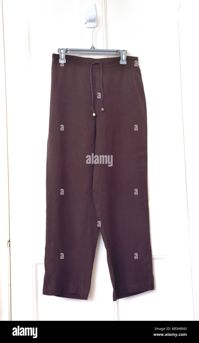 Ladies Brown Linen Trousers Stock Photo - Alamy