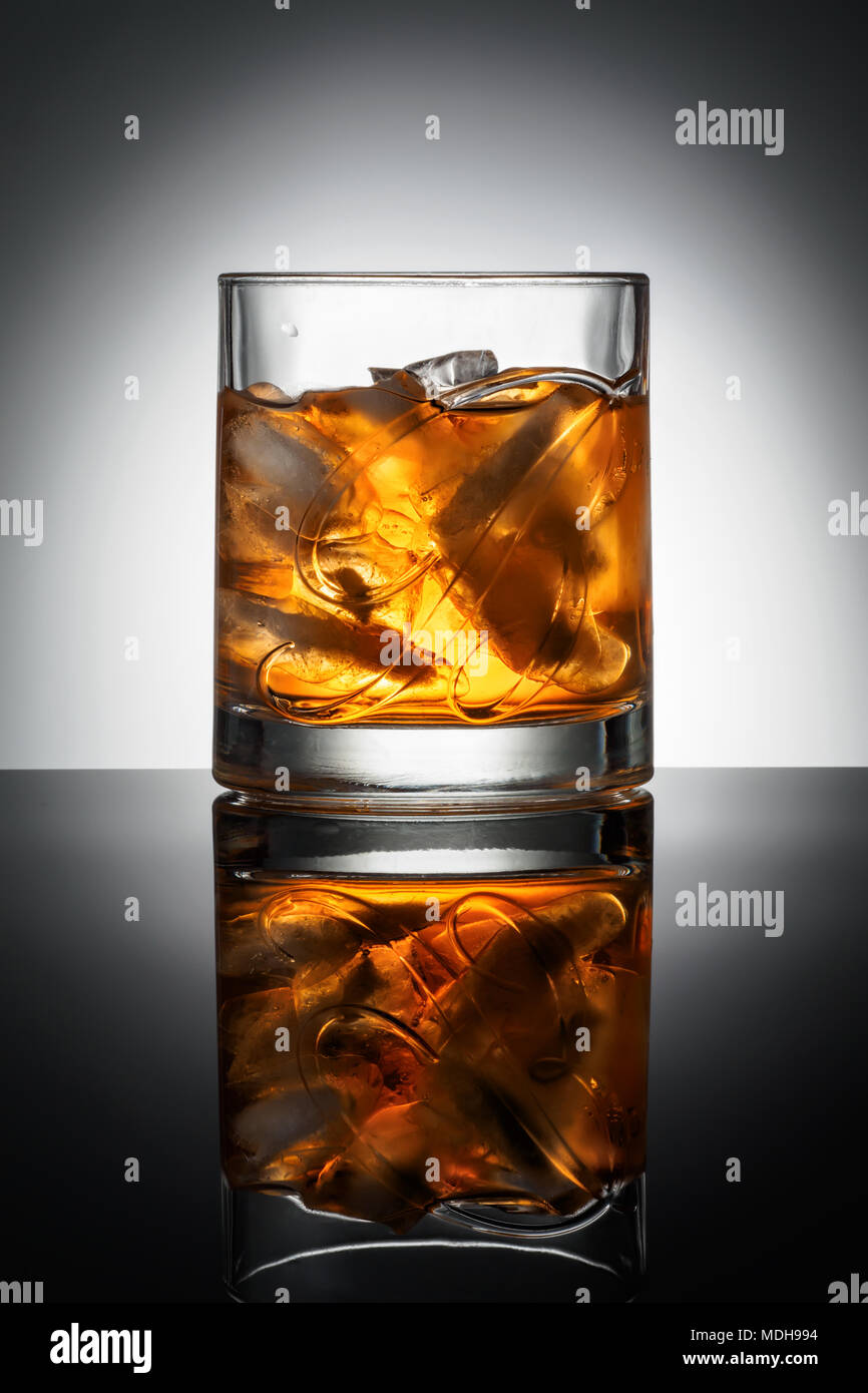 CHELYABINSK, RUSSIA - April 10,2018 Glass of Finest Blended Scotch Whiskey Ballantines Logo Delicious Scotch Whisky Ballantines is produced in Dambarton, Scotland by Pernod Ricard Editorial Photo Stock Photo