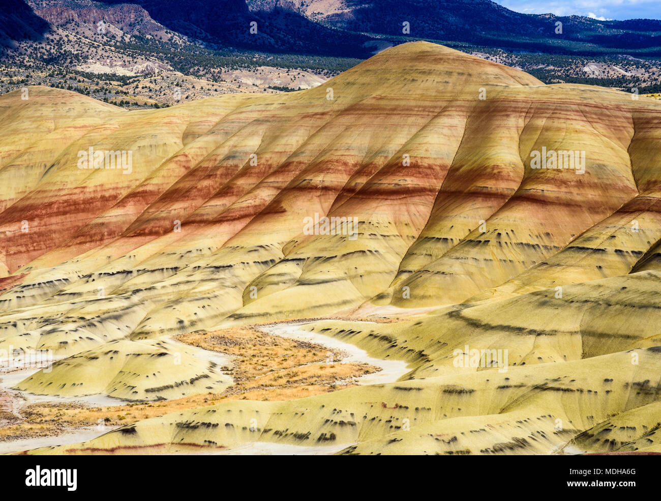 Colourful layers of minerals are exposed at John Day Fossil Beds National Monument; Mitchell, Oregon, United States of America Stock Photo