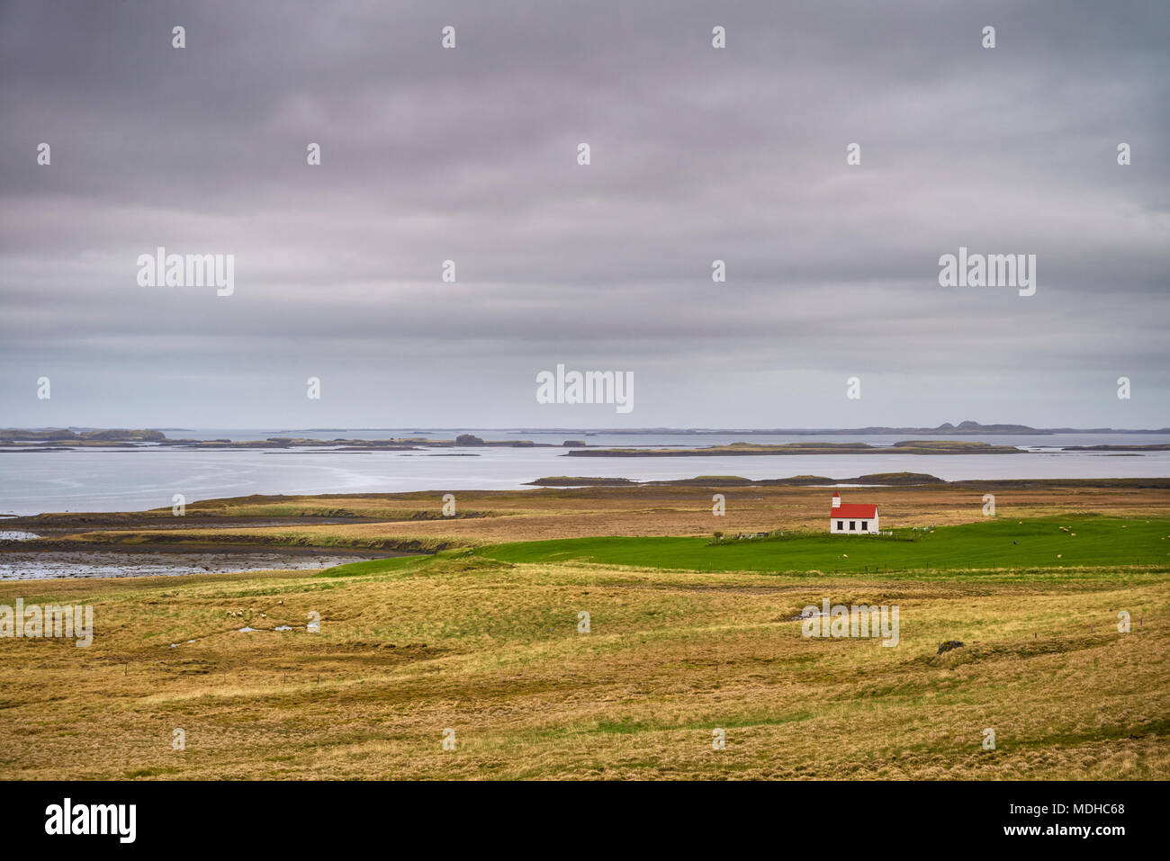 Remote church amongst fields near Stykkisholmur, Snaefellsnes peninsula; Iceland Stock Photo