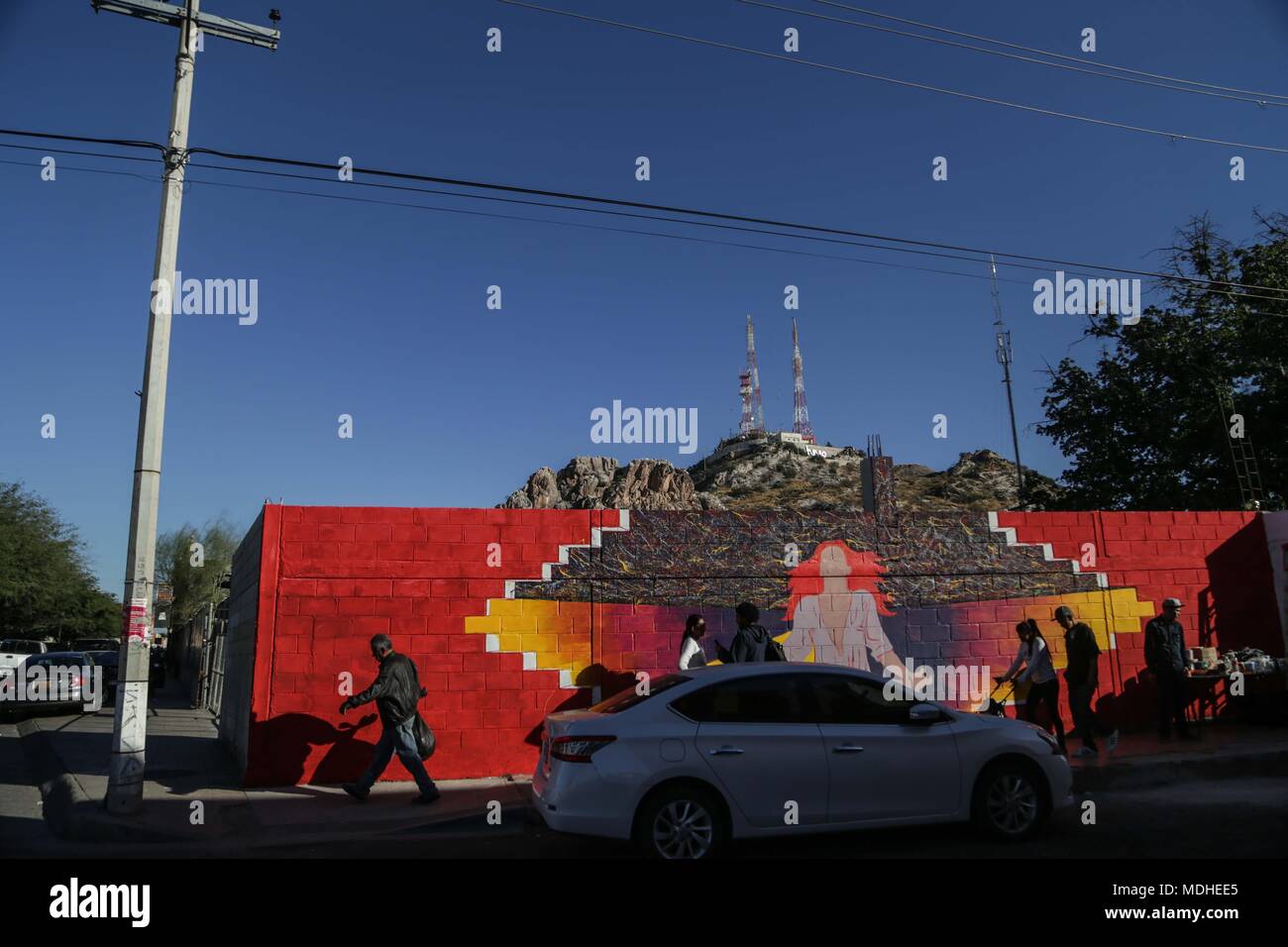 Rene Linares, painter originally from Guadalajara, paints mural in the Historic Center of Hermosillo, as part of the artistic projects of Casa Madrid. Stock Photo
