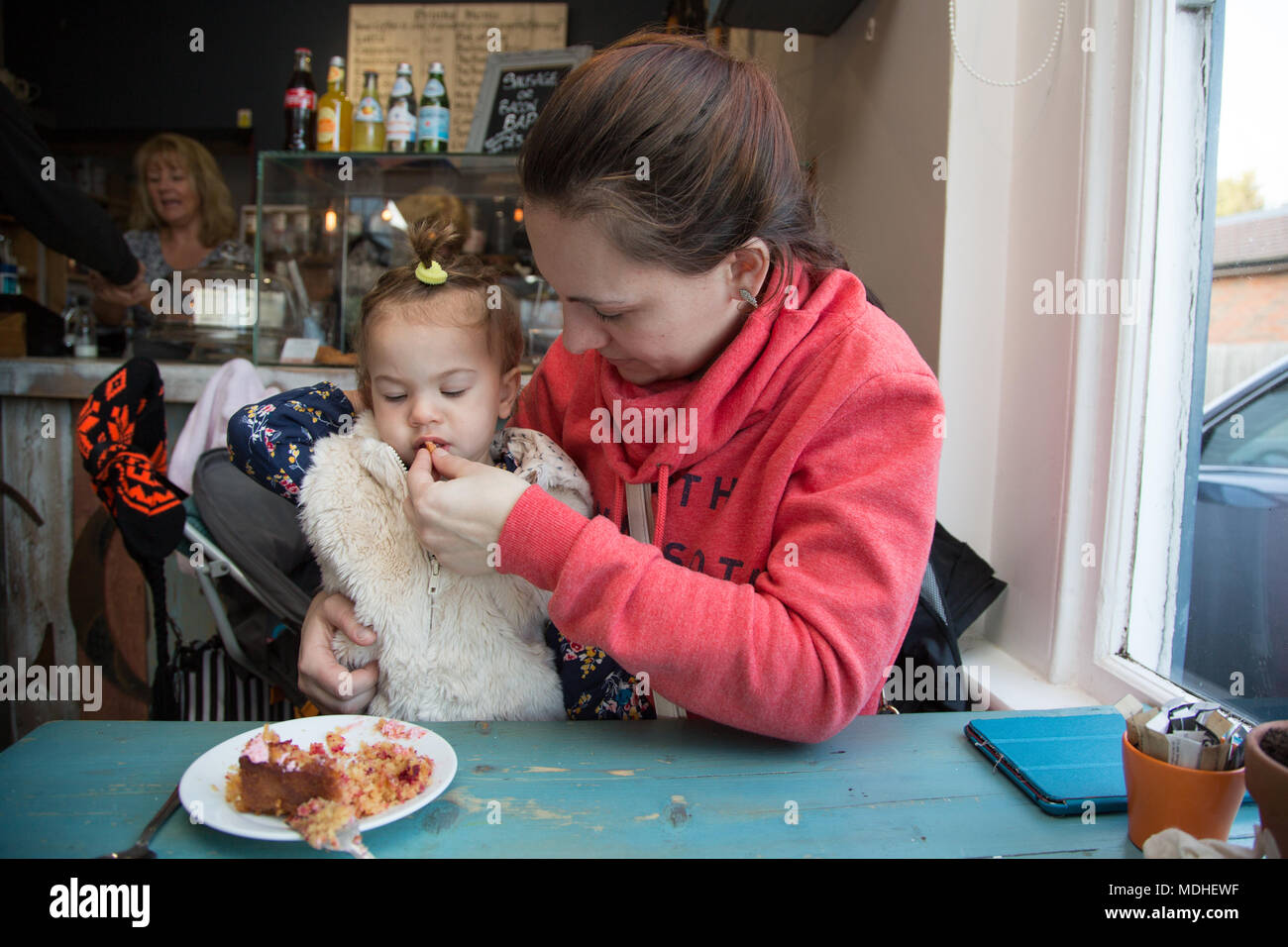 mother-trying-to-get-child-to-eat-stock-photo-alamy