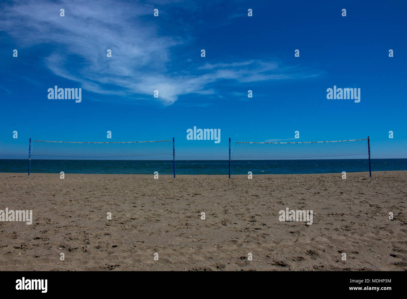 Beach. Volleyball net on a deserted beach. Estepona, Malaga, Costa del