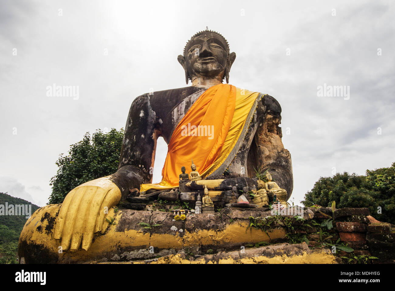 Buddha statue in the ruins of Wat Piawat temple, destroyed in the Indochina War; Muang Khoun