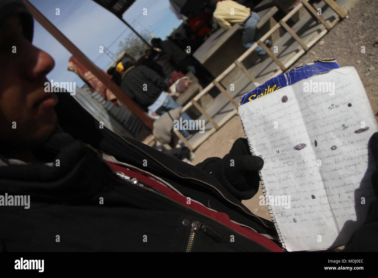 Migrantes Hondureños durante su paso por Hermosillo con rumbo al Norte se reúnen en un comedor a punto de medio dÃa. .staff /nortephoto.com,CREDI Stock Photo
