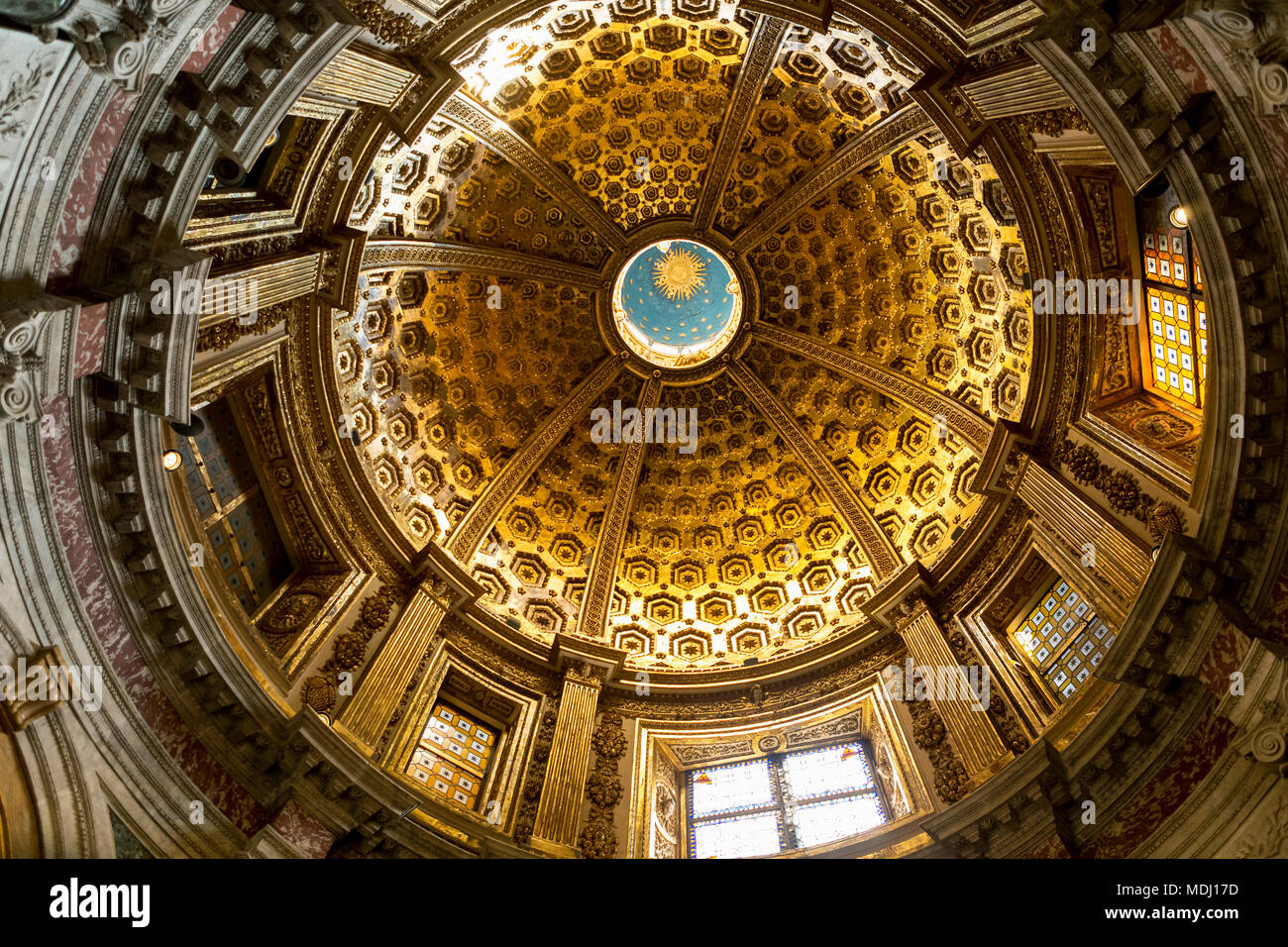 View of a cathedral dome with stained glass windows from directly below; Siena, Tuscany, Italy Stock Photo