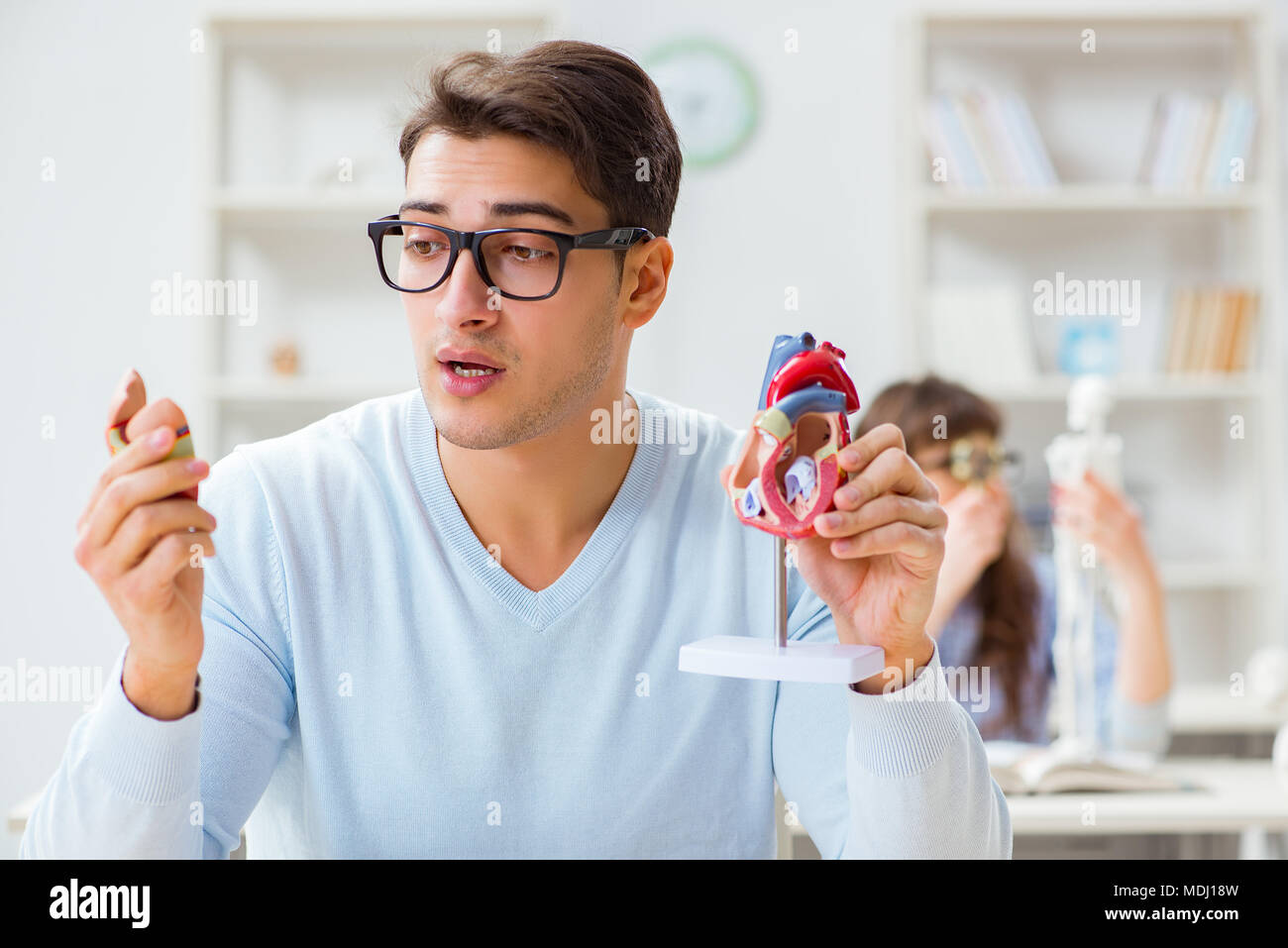 Two medical students studying in classroom Stock Photo Alamy