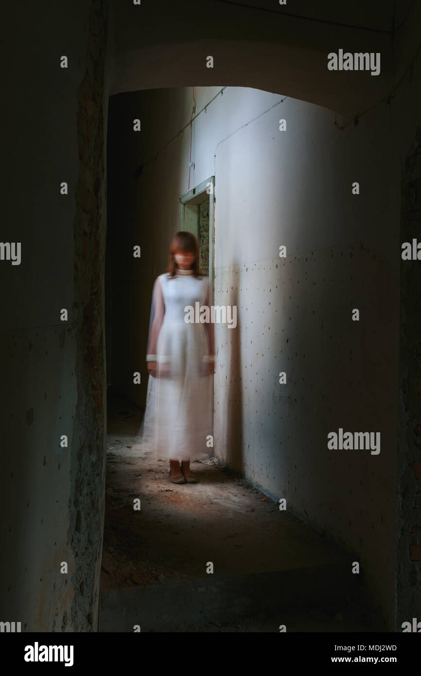 Horror ghost girl in abandoned building Stock Photo