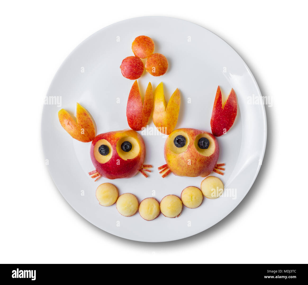 art food for children, crabs from red apples Stock Photo
