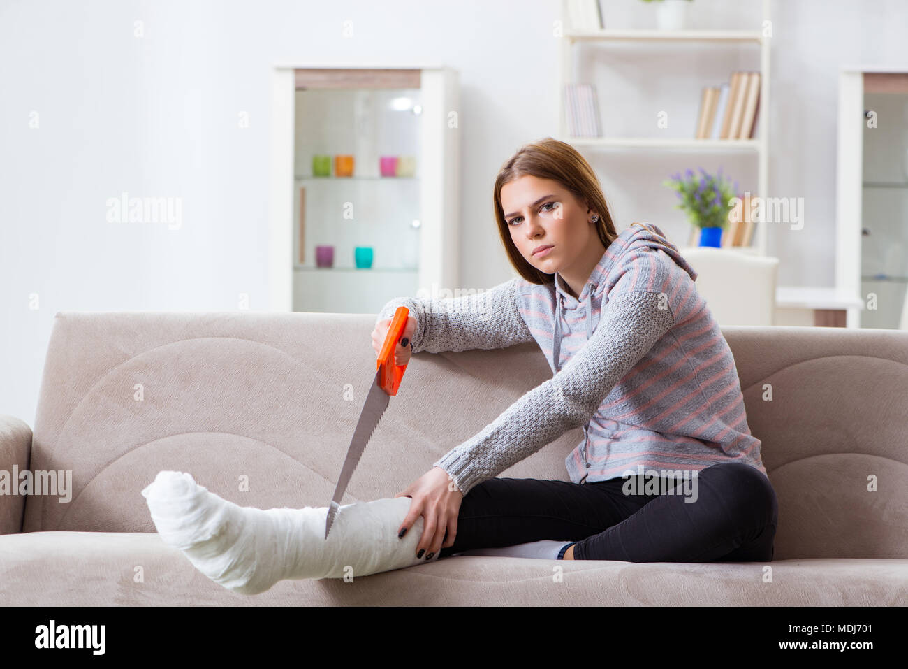 Young woman with broken leg at home Stock Photo Alamy