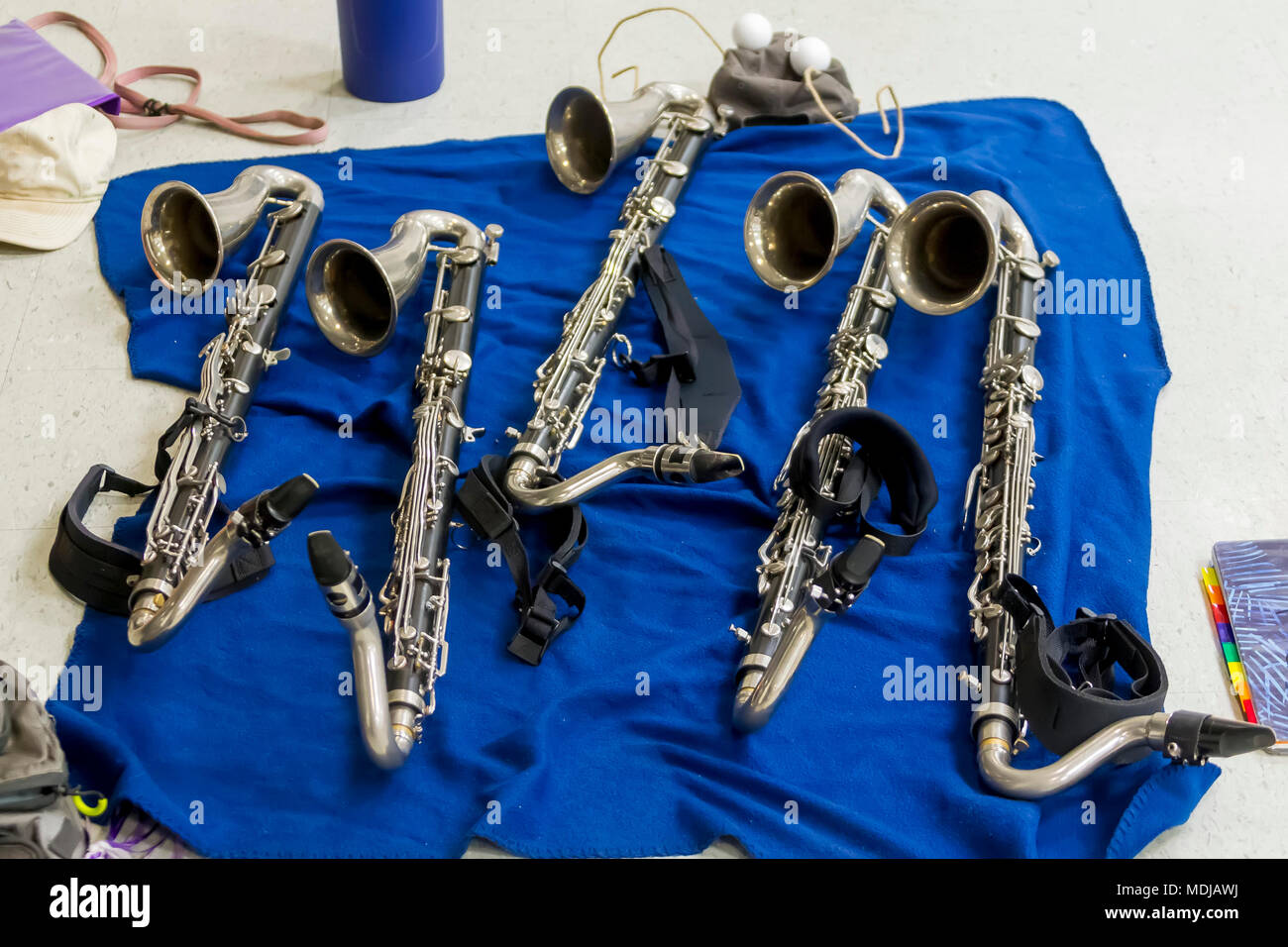 several bass clarinets resting on a blanket during rehearsal Stock Photo