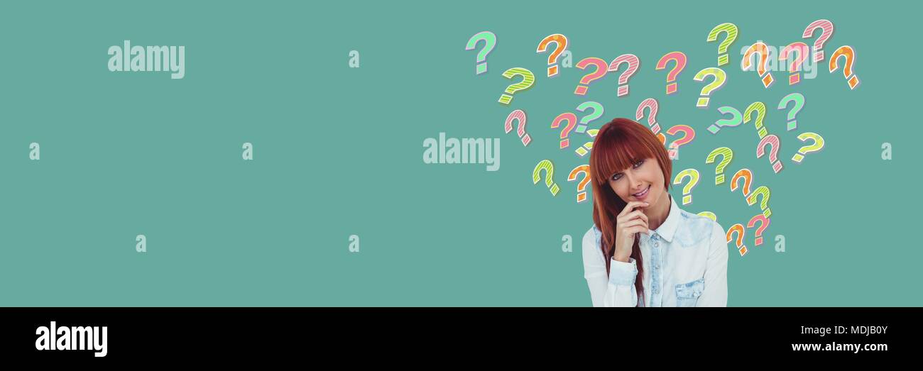 Woman thinking with colorful funky question marks Stock Photo