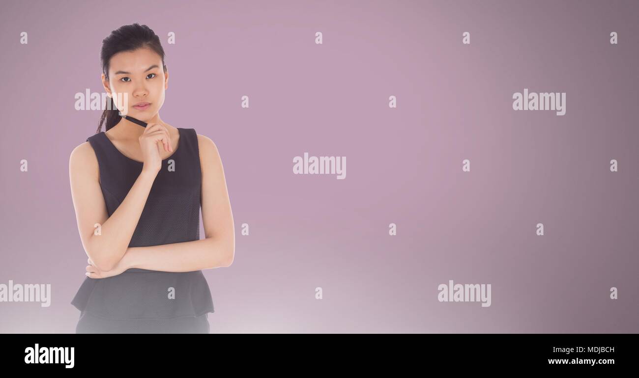 Woman thinking in front of pink background Stock Photo - Alamy