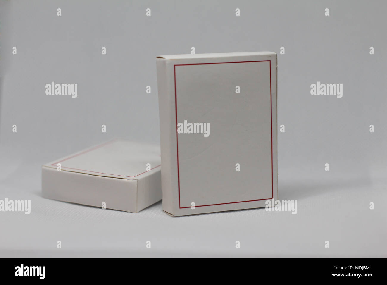 Rectangular cardboard tall box for cosmetics on white background. Stock Photo