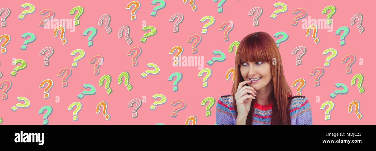 Woman thinking with colorful funky question marks Stock Photo