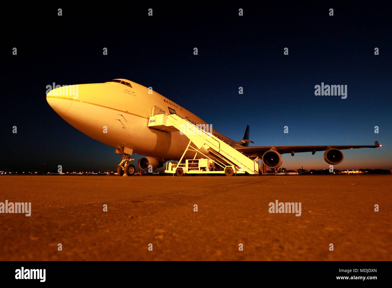 Saudia Boeing 747-400SF Freighter being loaded during sunrise Stock Photo