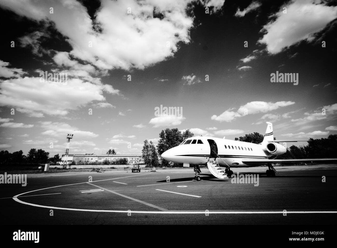 Falcon 2000 business jet is waiting for passengers and ready to go Stock Photo