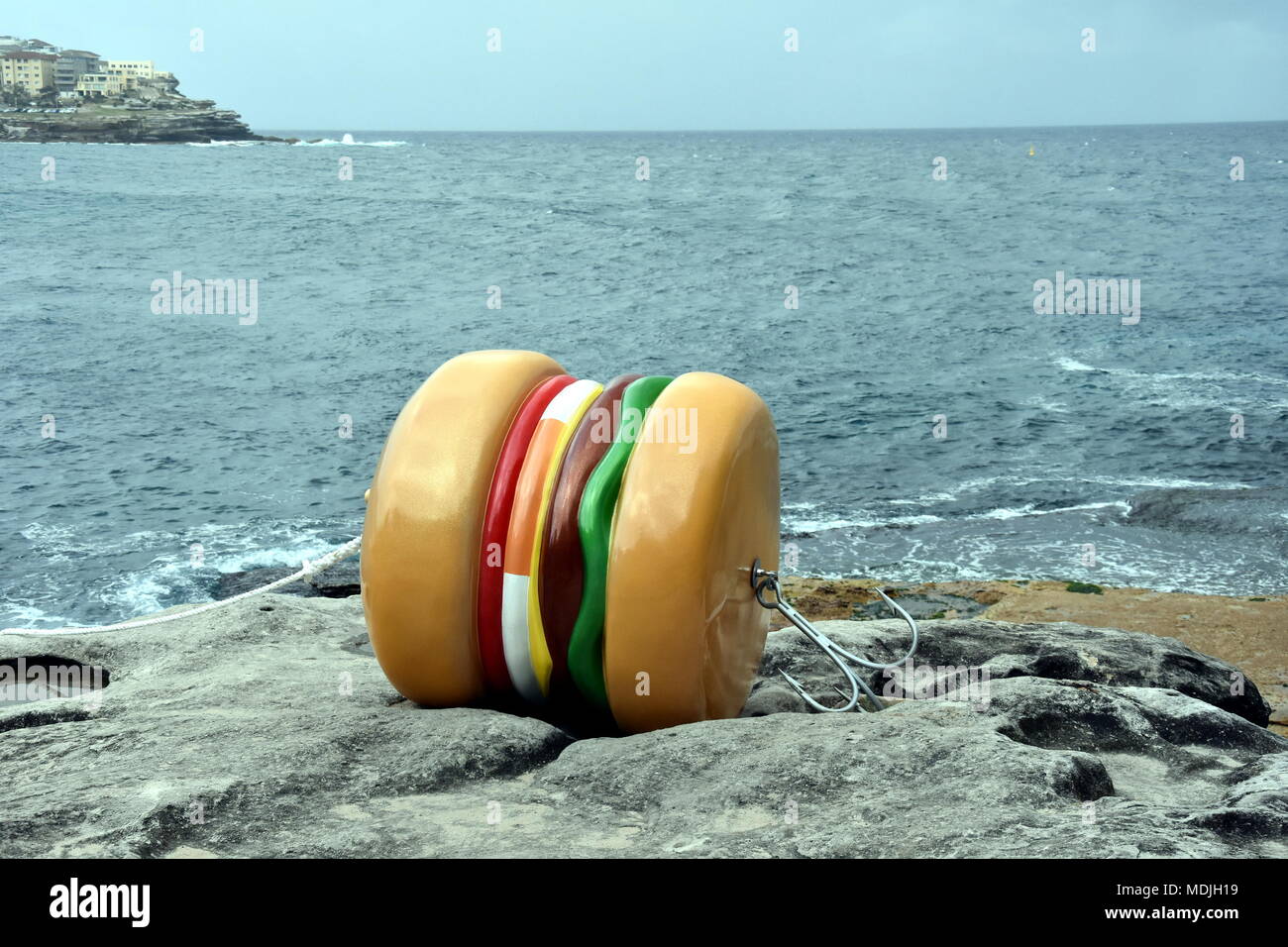 Sydney, Australia - Oct 27, 2017. James Dive: What a Tasty Looking Burger. Sculpture by the Sea along the Bondi to Coogee coastal walk is the world's  Stock Photo