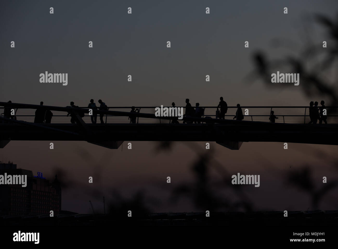 London, UK. 19th April, 2018. UK Weather: Beautiful sunset over the River Thames, with Millennium Bridge in silhouette in London, UK Credit: Carol MoirAlamy Live News Stock Photo Stock Photo