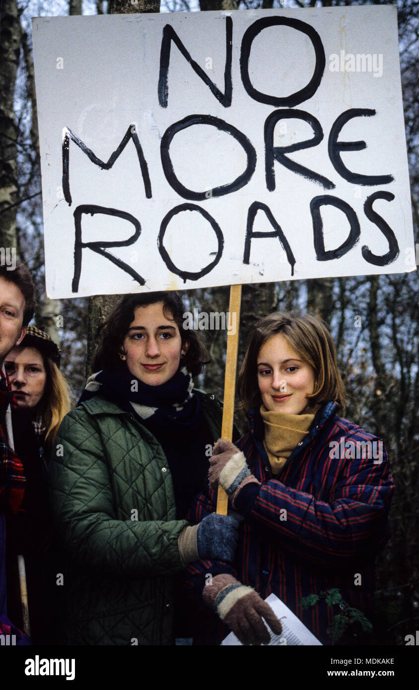 Two Young Women Holding No More Roads Sign, Newbury Bypass Road Building and Protests, Newbury, Berkshire, England, UK,GB. Stock Photo
