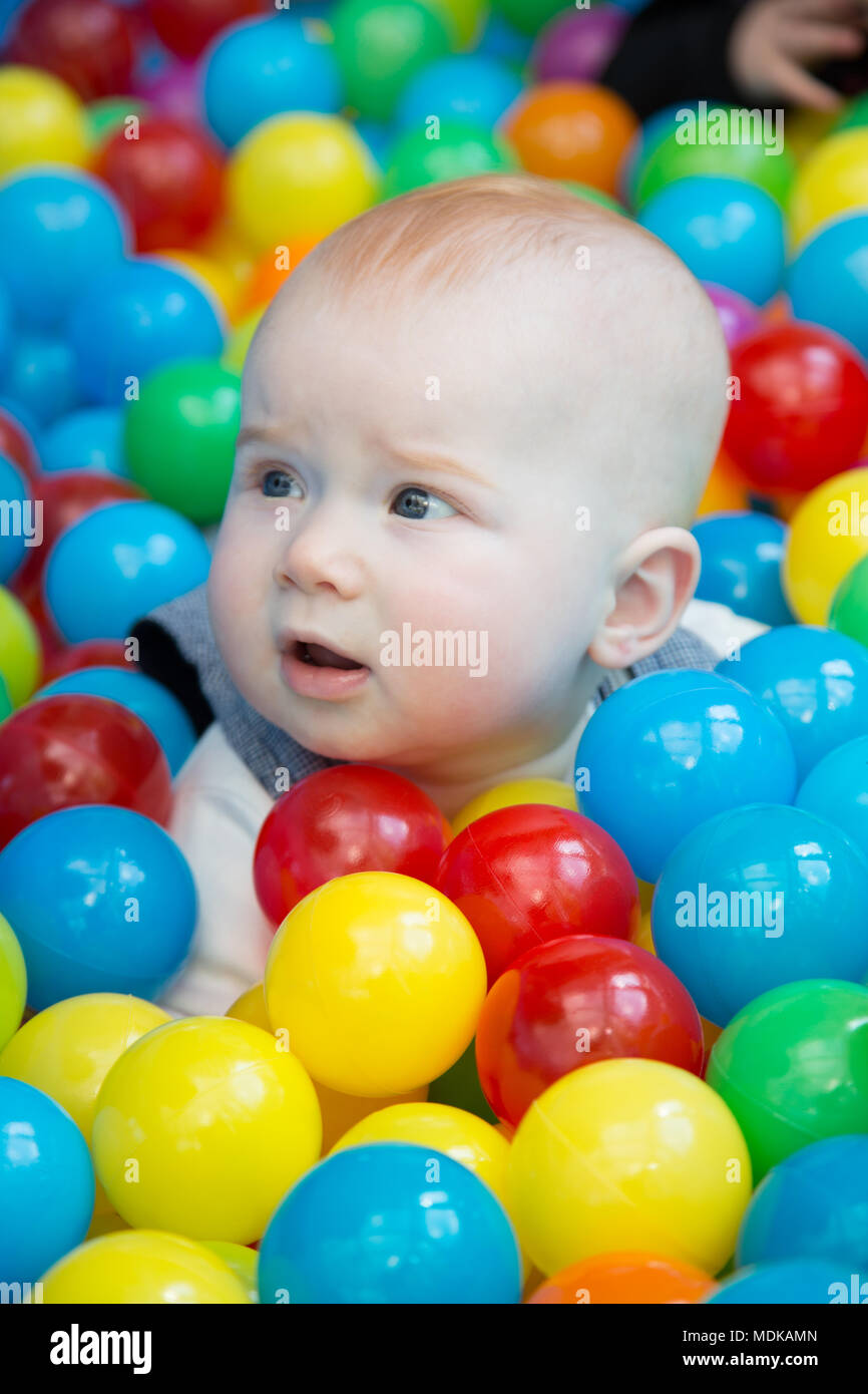 Baby In Ball Pit Stock Photo Alamy