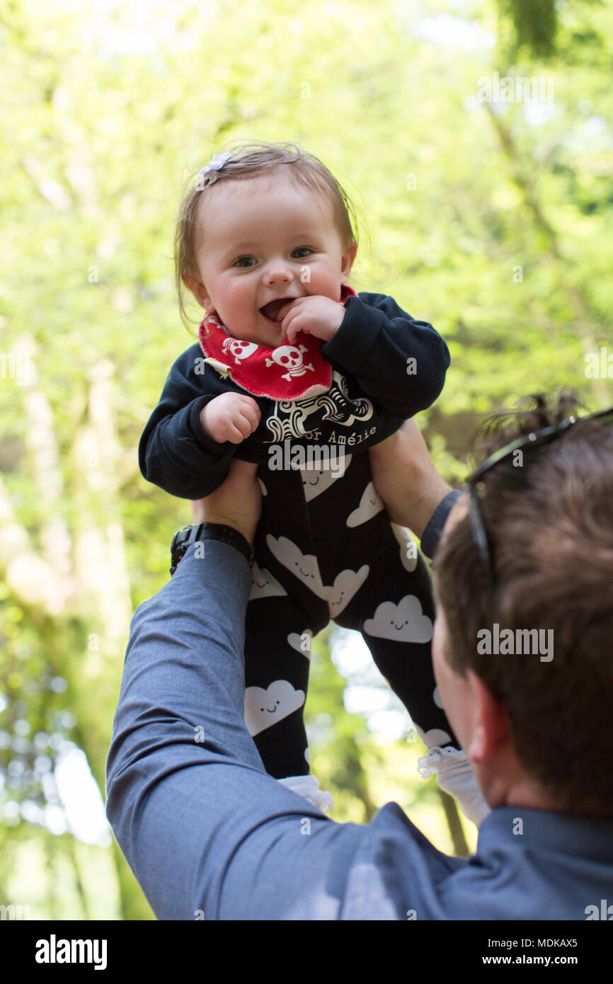 dad-lifting-baby-daughter-above-his-head-stock-photo-alamy