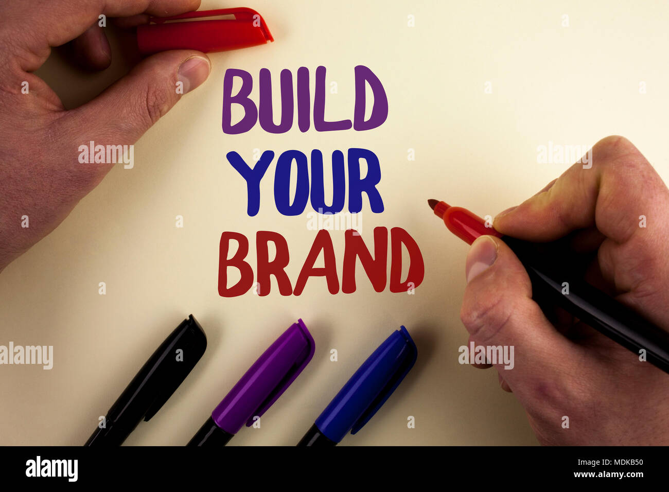 Text sign showing Build Your Brand. Conceptual photo create your own logo slogan Model Advertising E Marketing written by Man plain background Markers Stock Photo