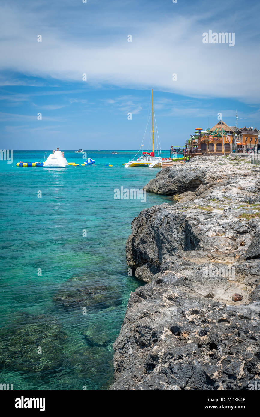 A view of Jimmy Buffet's Margaritaville and its water attractions from the cliffs of Montego Bay on the north coast of Jamaica. Stock Photo