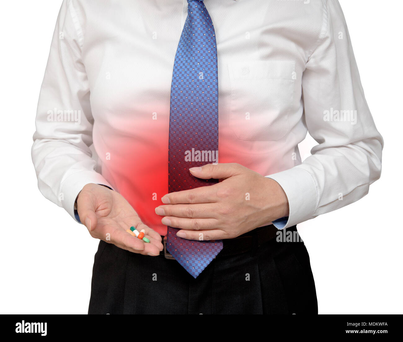 Businessman holding his stomach in pain with stomachache or indigestion Stock Photo
