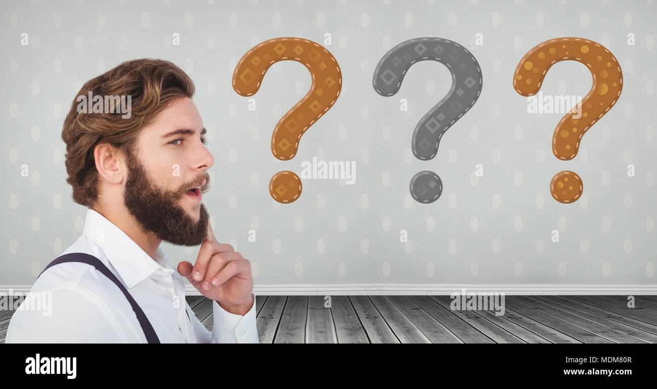 Bearded Man thinking with stitched question marks Stock Photo