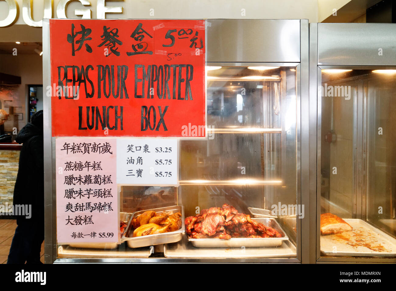 Food ready for lunch boxes in Ruby Rouge chinese restaurant in Montreal's chinatown Stock Photo