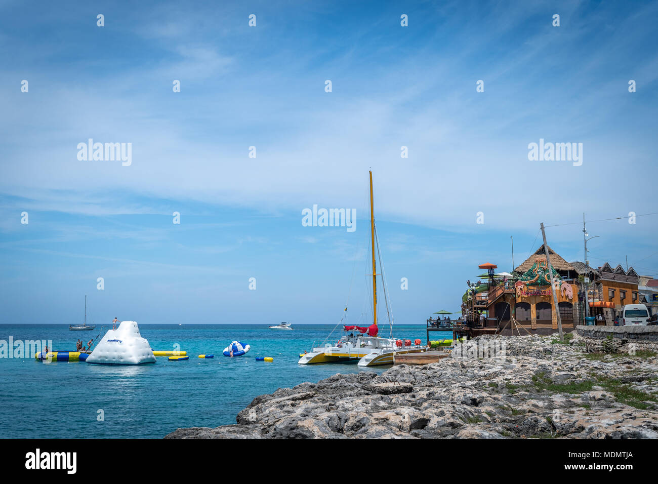 A view of Jimmy Buffet's Margaritaville and its water attractions from the cliffs of Montego Bay on the north coast of Jamaica. Stock Photo