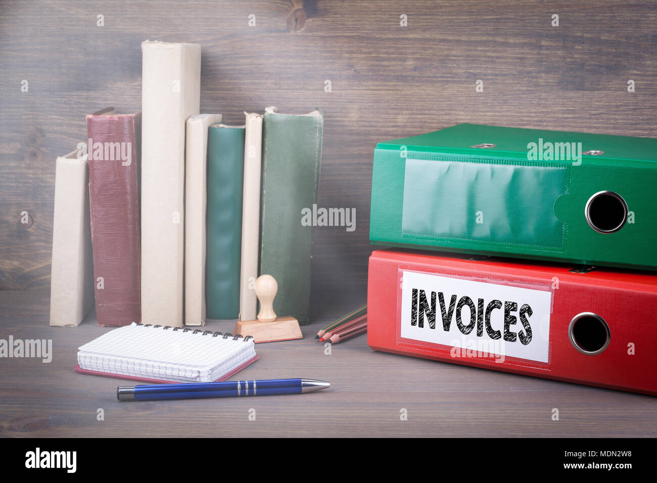 Invoices. Binder on desk in the office. Business background Stock Photo