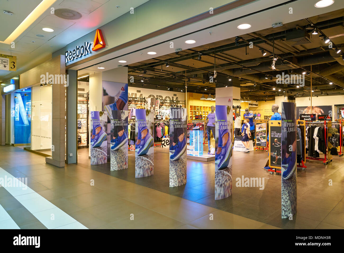 SAINT PETERSBURG, RUSSIA - CIRCA AUGUST, 2017: Reebok store at Galeria shopping center. Reebok is a global athletic footwear and apparel company Stock Photo -