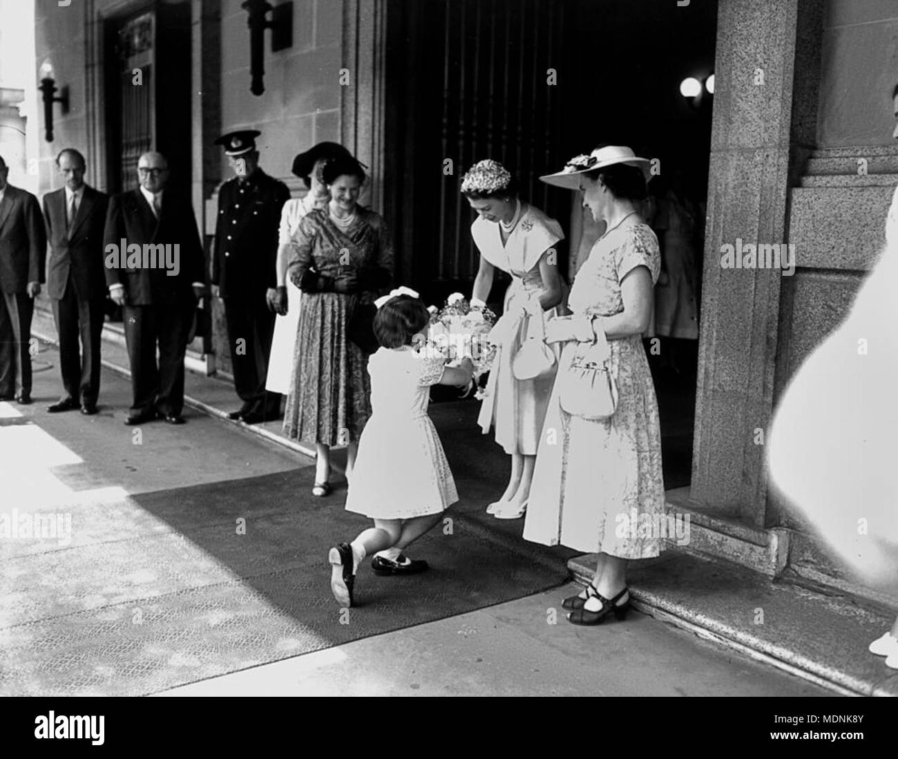 Presenting the queen with flowers hi-res stock photography and images ...